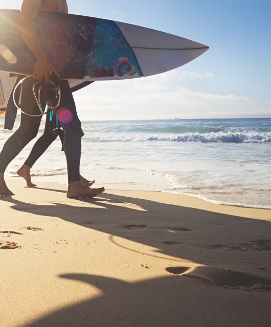 surfers on Australian Beaches