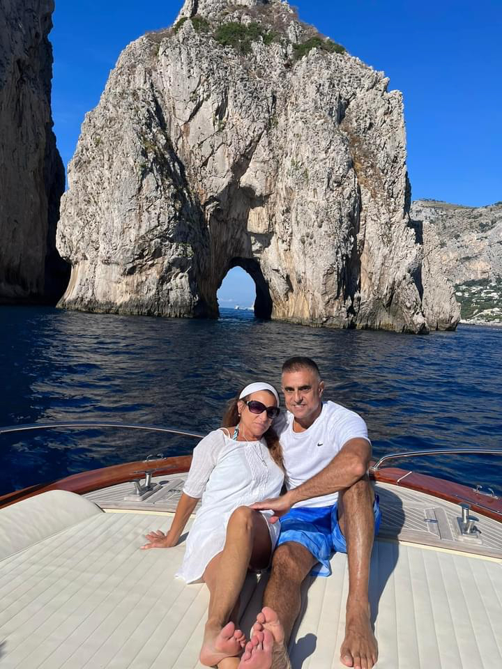 Theresa, the blog's author, and her husband Jody in Italy on a boat.