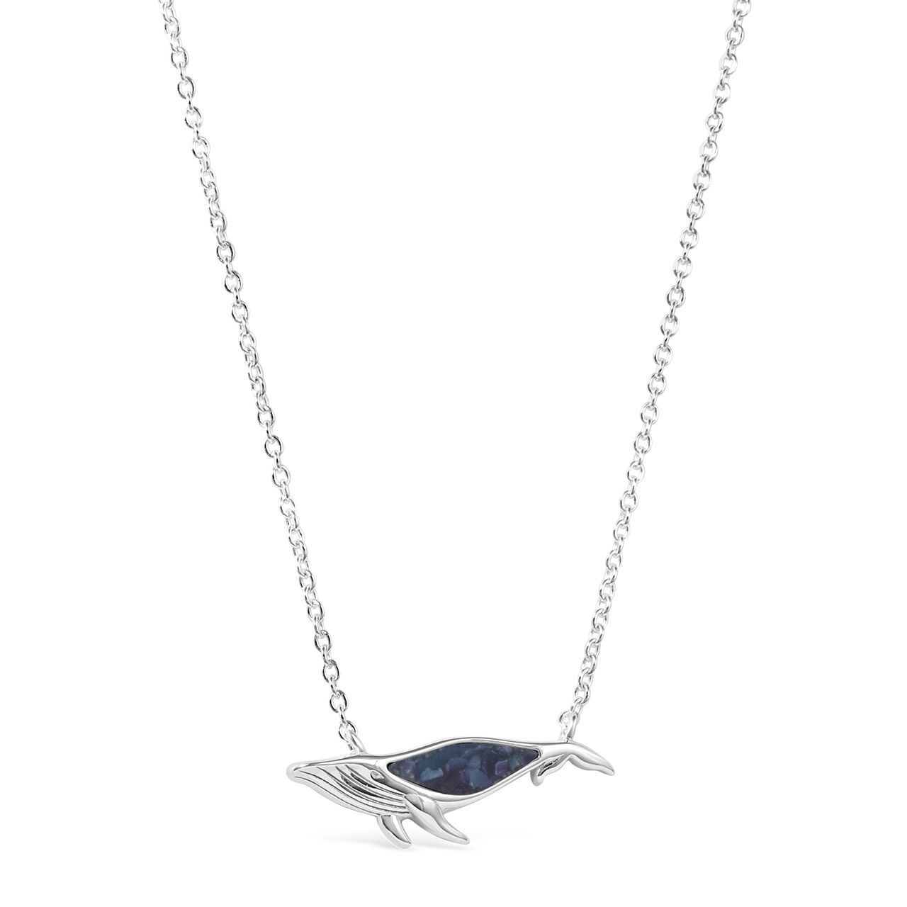 Sterling silver ocean-inspired necklace with an adjustable cable chain, humpback whale pendant and sand and earth elements.