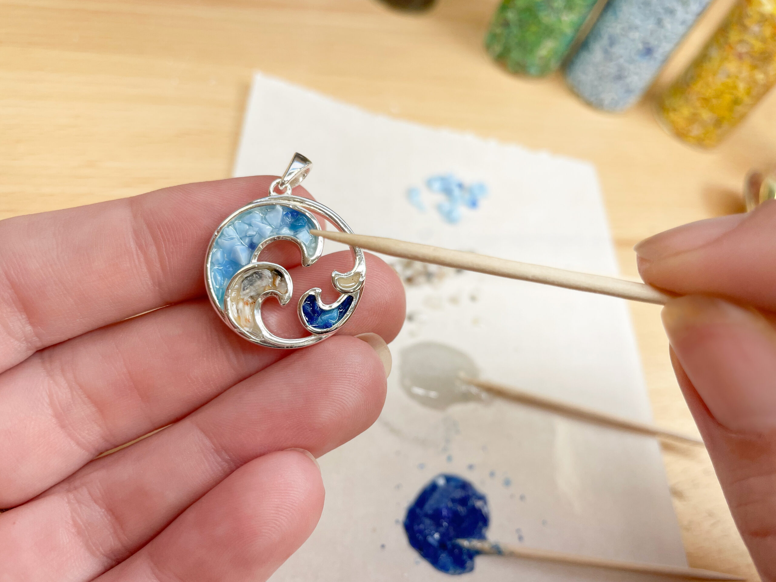 Handcrafting the Dune x 4ocean Ocean Soul Necklace.