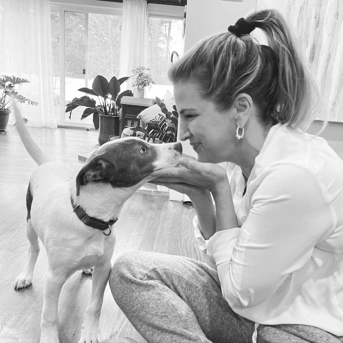 Holly, founder and CEO of Dune Jewelry, and her dog for National Pet Day.