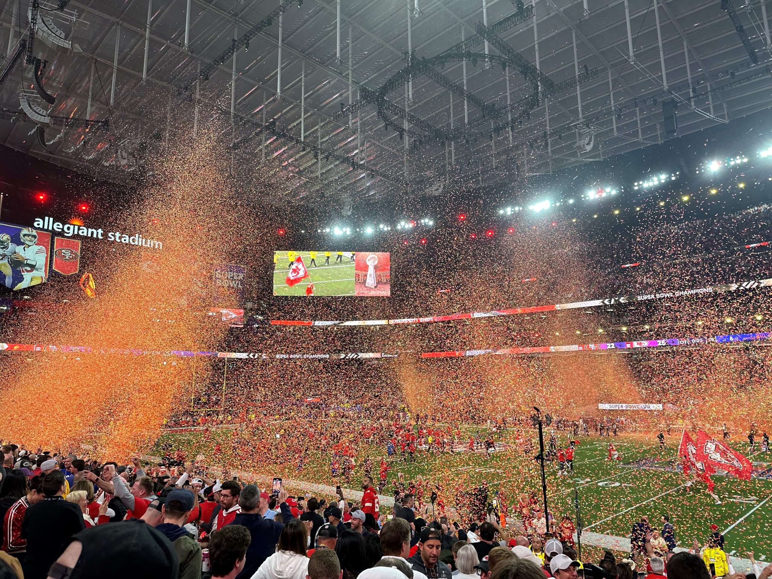Colorful Super Bowl victory confetti in the air.