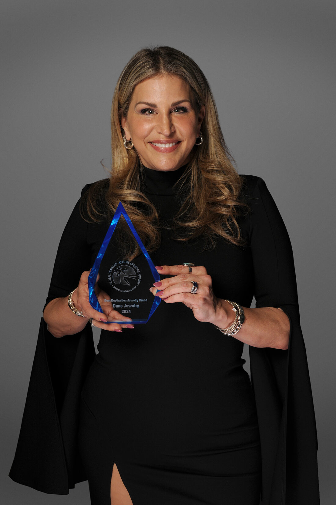 Holly, Founder of Dune Jewelry, accepts the award for Best Destination Jewelry Brand.