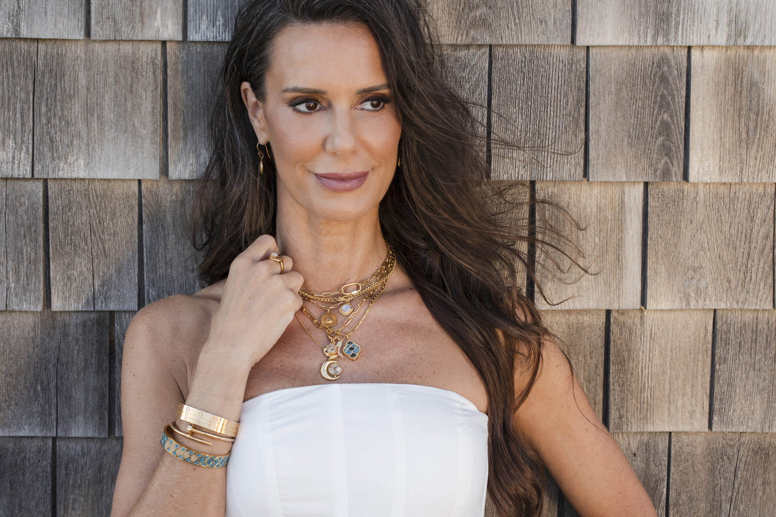 Captain Kate collection with Dune Jewelry featuring her travel treasure charms.