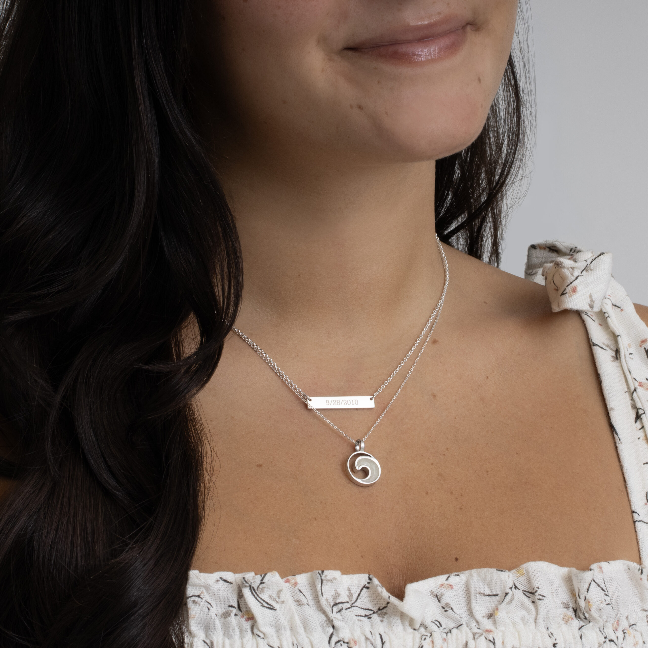 The Engravable Necklace and Wave Necklace.