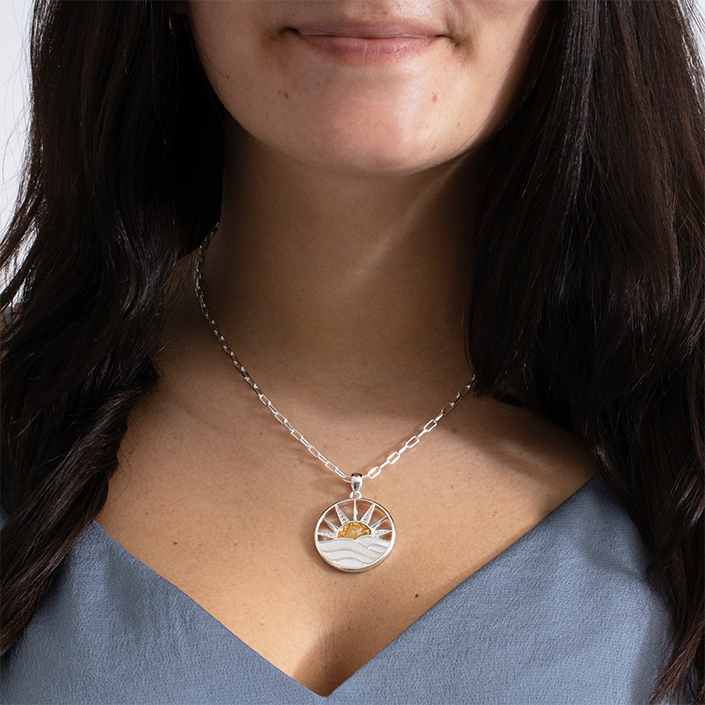 Sun necklace with Mother of Pearl and White Topaz in a seaside sunrise design.
