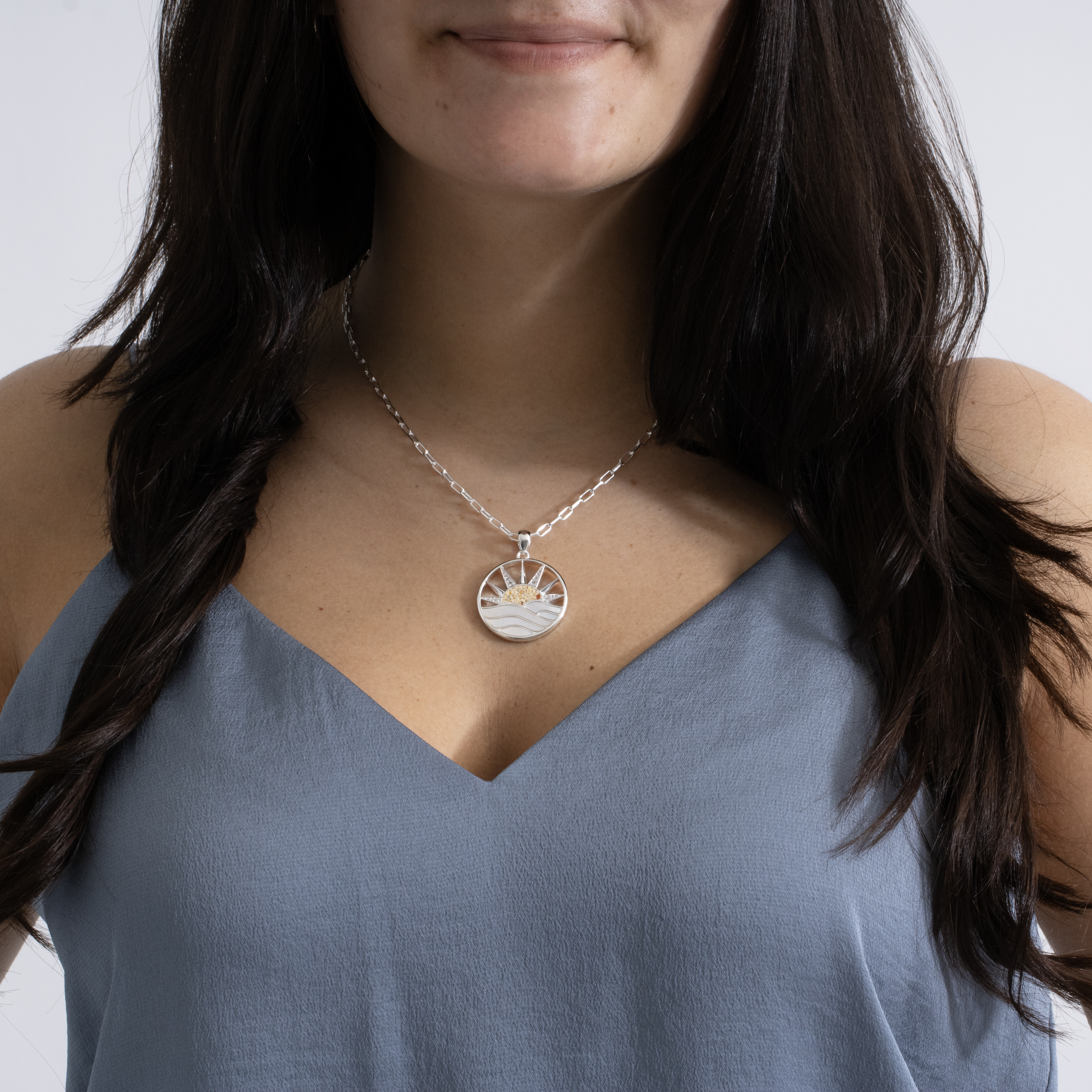 Sun necklace with Mother of Pearl and White Topaz in a seaside sunrise design. 