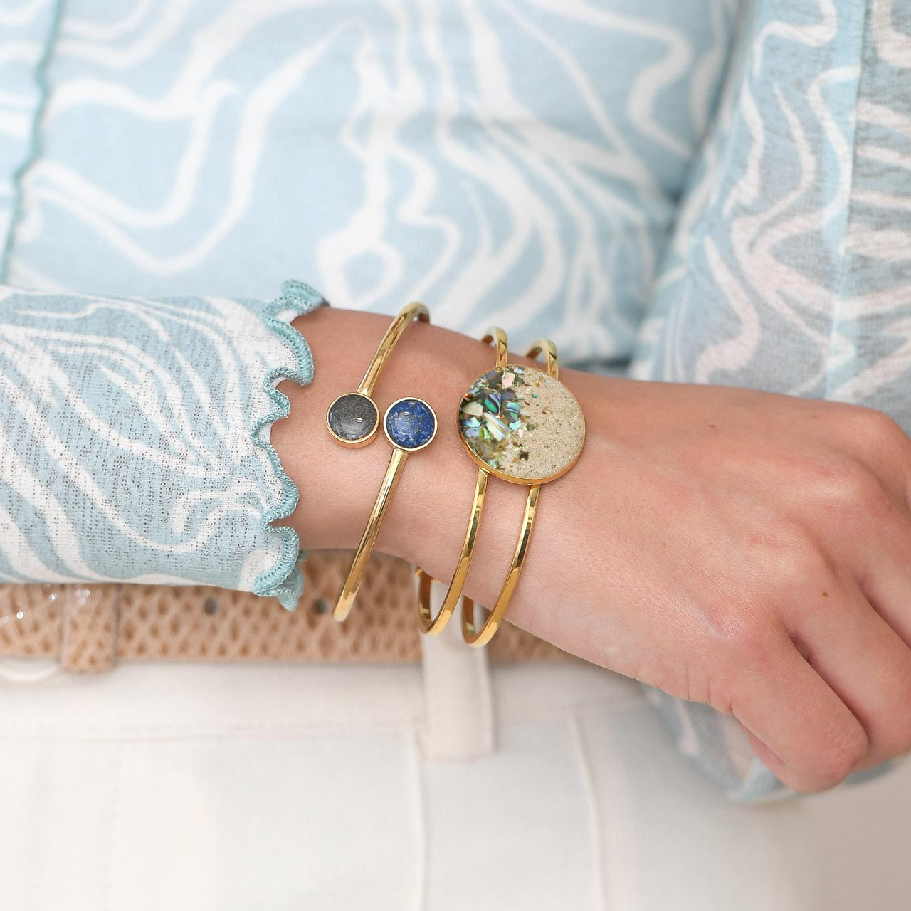 Discover abalone symbolism with this bold 14k gold coastal jewelry Marina Bracelet perfect to wear on a yacht or at the beach. Abalone jewelry is a symbol of good luck and wellbeing.