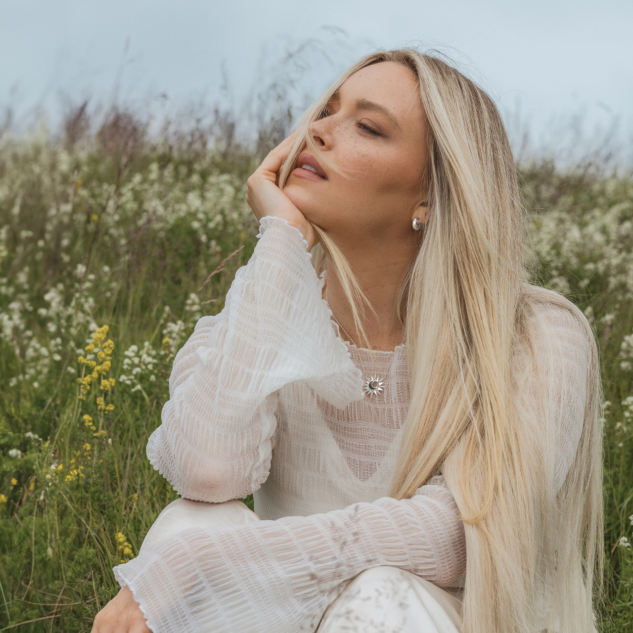 Small size sterling silver and cultured diamond hoop earrings inspired by the stars and the galaxy. Designed with Camille Kostek. 