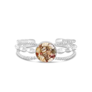 Boho cuff bracelet with three detailed bands, featuring shell fragments in a domed, glass-like finish, embodying coastal bohemian style.