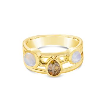 Ocean trio stacker ring by Captain Kate, featuring two flanking moonstone cabochons and a sand or earth element as center stage.