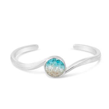 Cuff bracelet handcrafted with sterling silver featuring an ocean wave design, ocean gradient and your choice of sand or element. Great jewelry design for ocean aficionados and beach lovers.