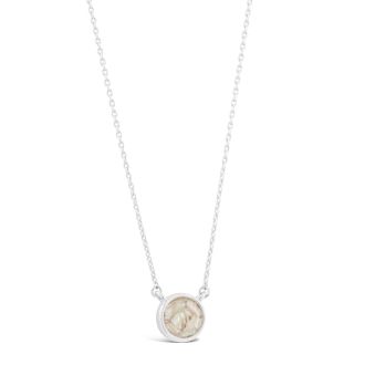Dainty birth month jewelry featuring a round design with Baby's Ear Shell and a cable chain necklace. Perfect October birthday gift or holiday gift.