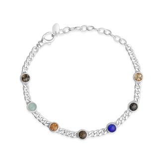 Sterling silver cuban chain bracelet with seven customizable sand and earth element settings, inspired by travel memories made in every continent.
