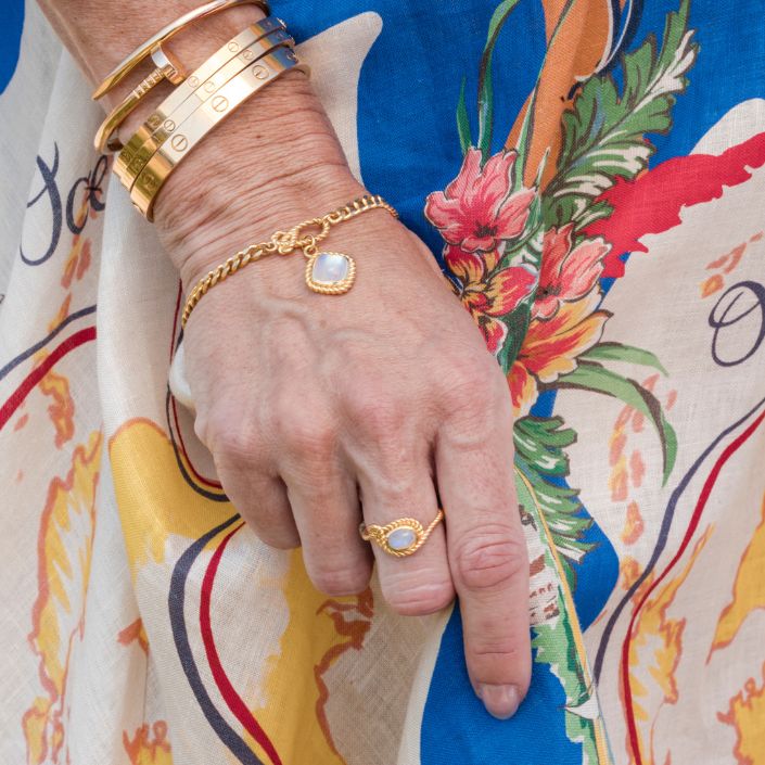 Sterling silver Mariner’s Moonstone design featuring a radiant rainbow moonstone bracelet in a nautical knot design, the perfect nautical jewelry for her, for ocean-inspired elegance.