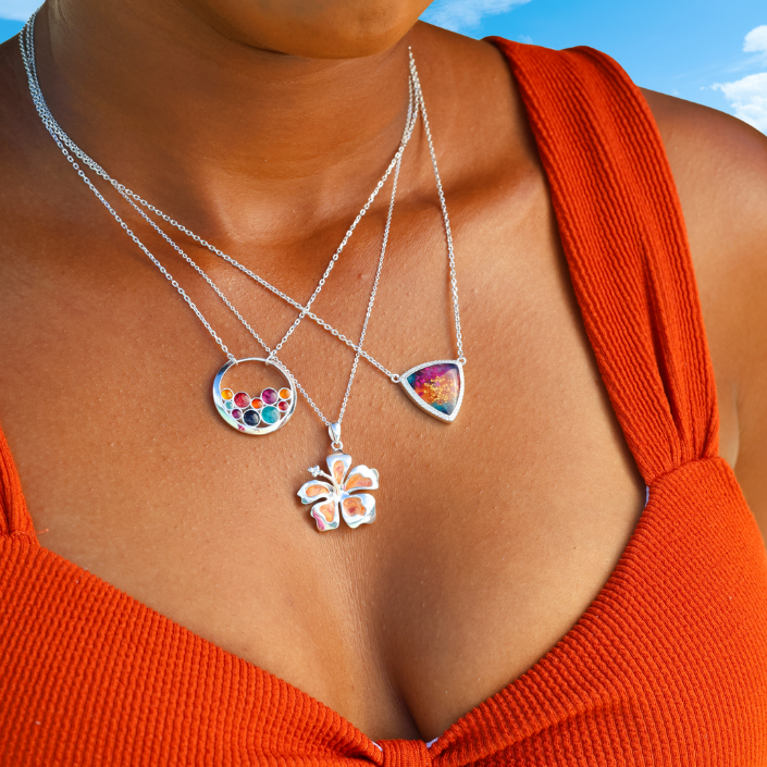 Sunset necklace with colorful gradient in a sterling silver trillion pendant.