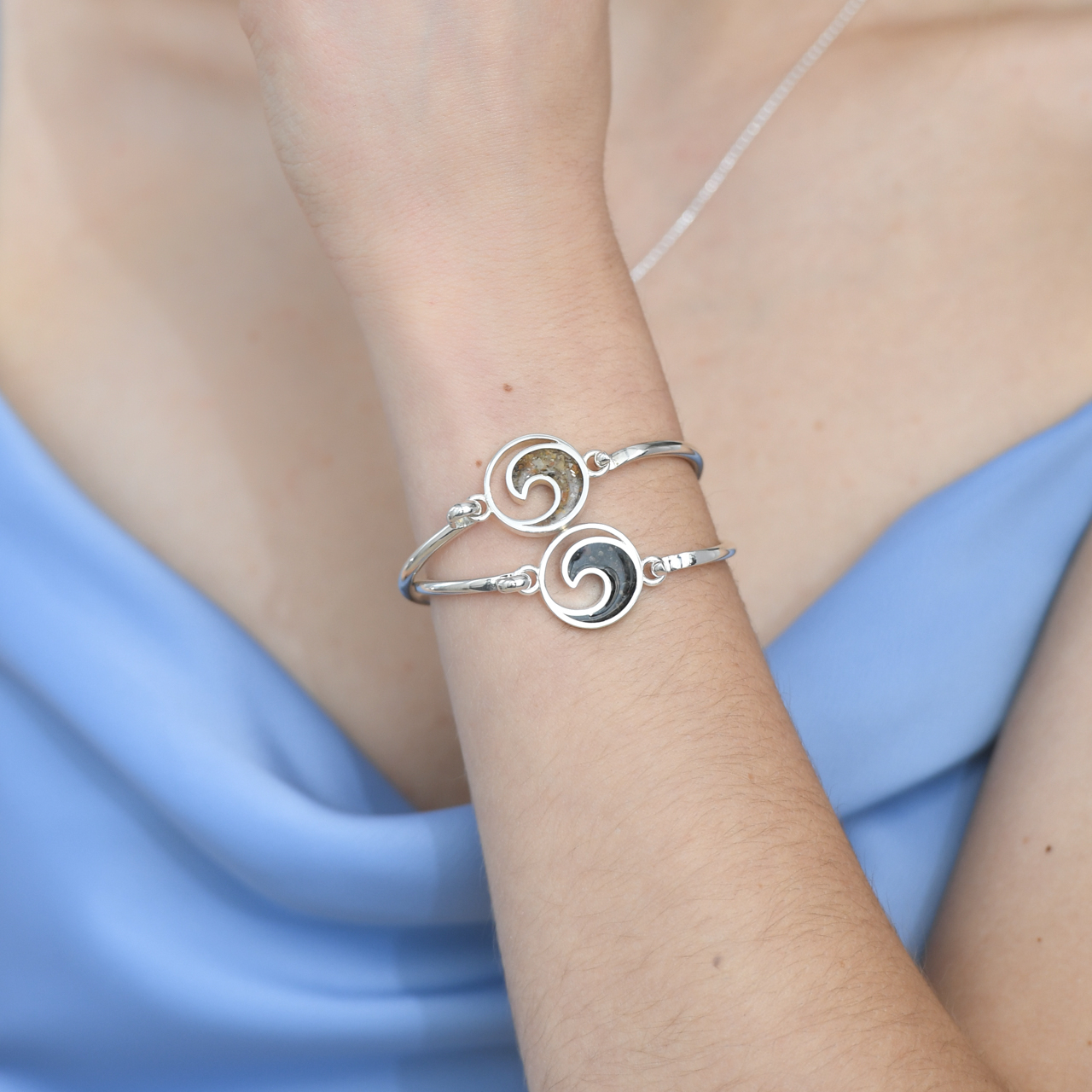 Nautical bracelet handcrafted with sterling silver featuring an ocean wave design and your choice of sand or element. Great simple yet elegant jewelry design for ocean aficionados and beach lovers.